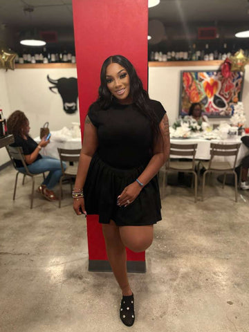 Step into timeless elegance with Ajike  Black Luxe Open-Back Mini Dress