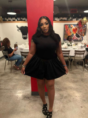 Step into timeless elegance with Ajike  Black Luxe Open-Back Mini Dress