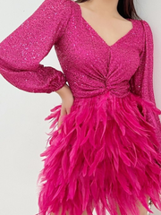 Featherme in pink sequin dress