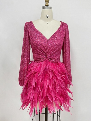 Featherme in pink sequin dress