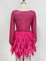 Featherme in pink sequin dress